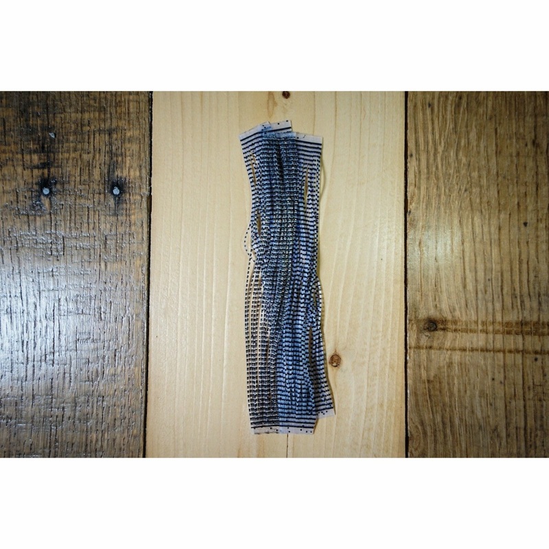 Grizzly Flutter Legs – Black Barred Clear UV